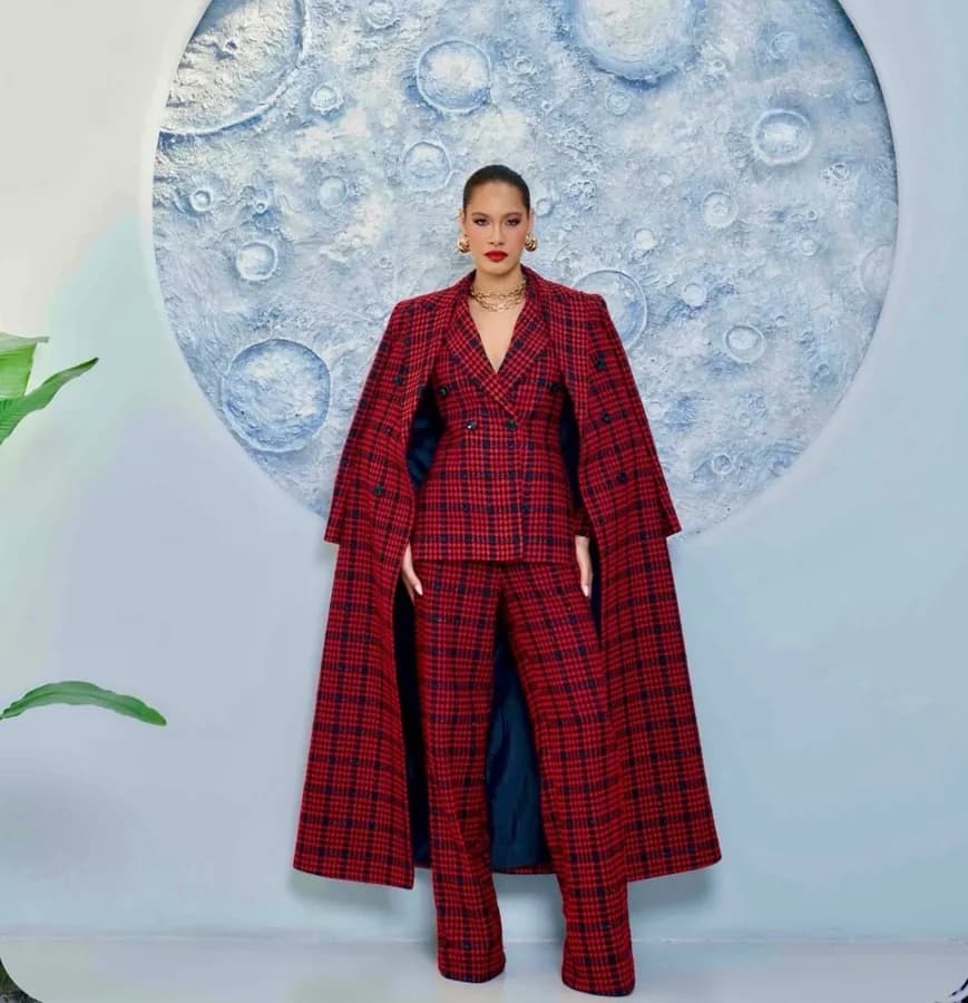 Olarsgrace editorial look on set — tailored check suiting