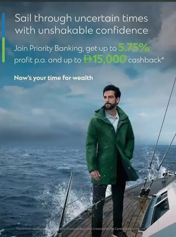 Standard Chartered Priority Banking campaign creative — sailing scenario