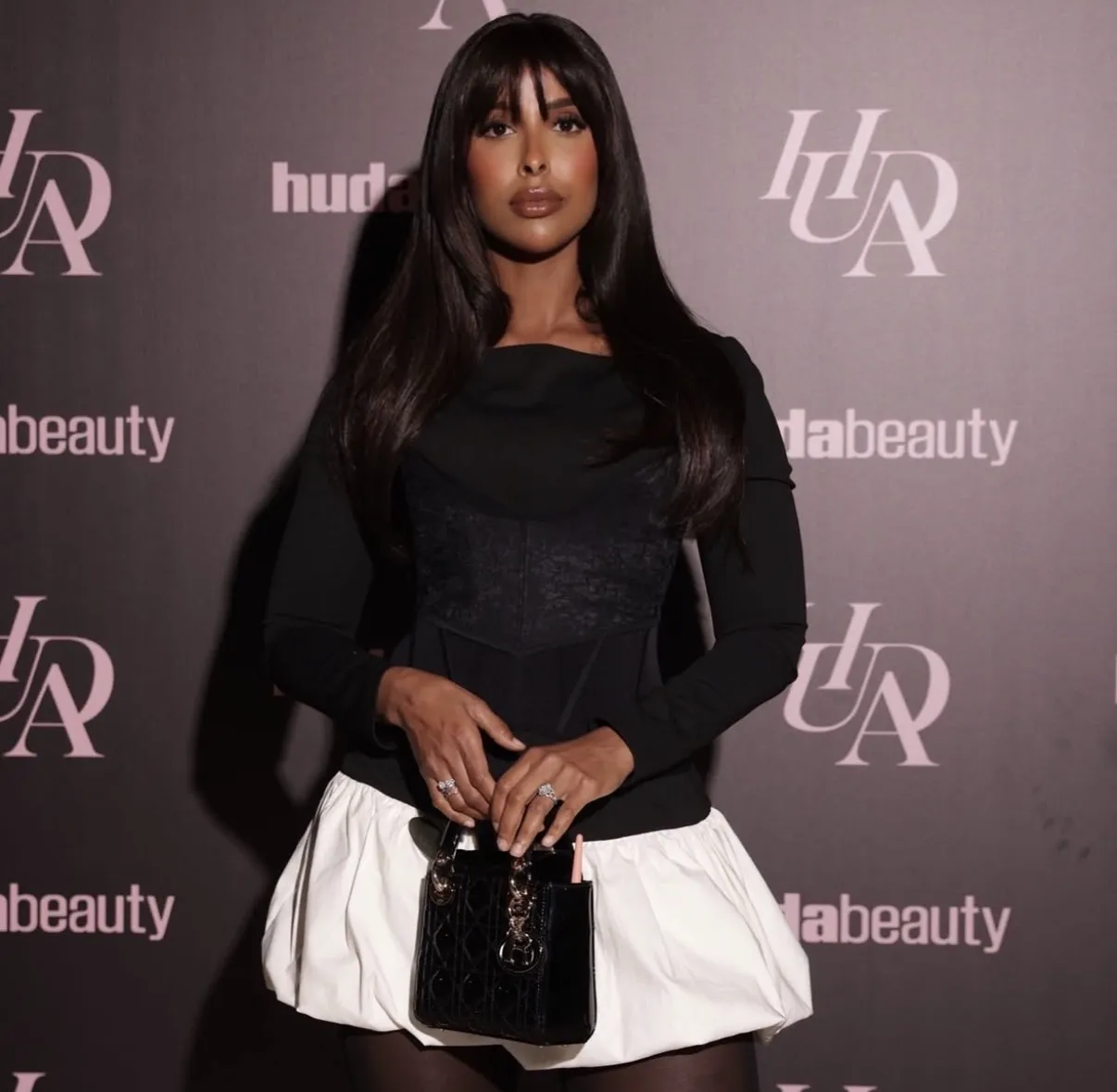 Event styling — guest at a Huda Beauty brand event