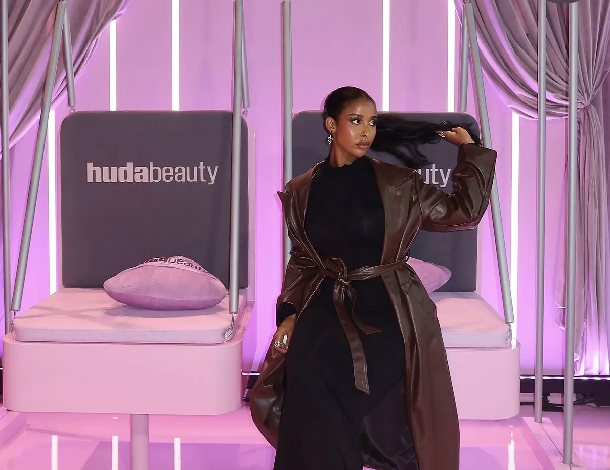 Event styling — leather coat look at a Huda Beauty brand event